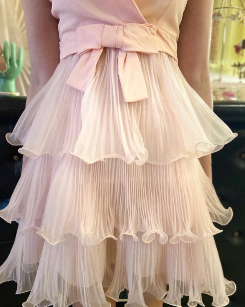 A vintage tiered organza pink dress available for purchase at Jess James Co.
